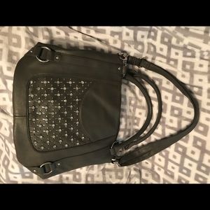 Maurice’s shoulder bag